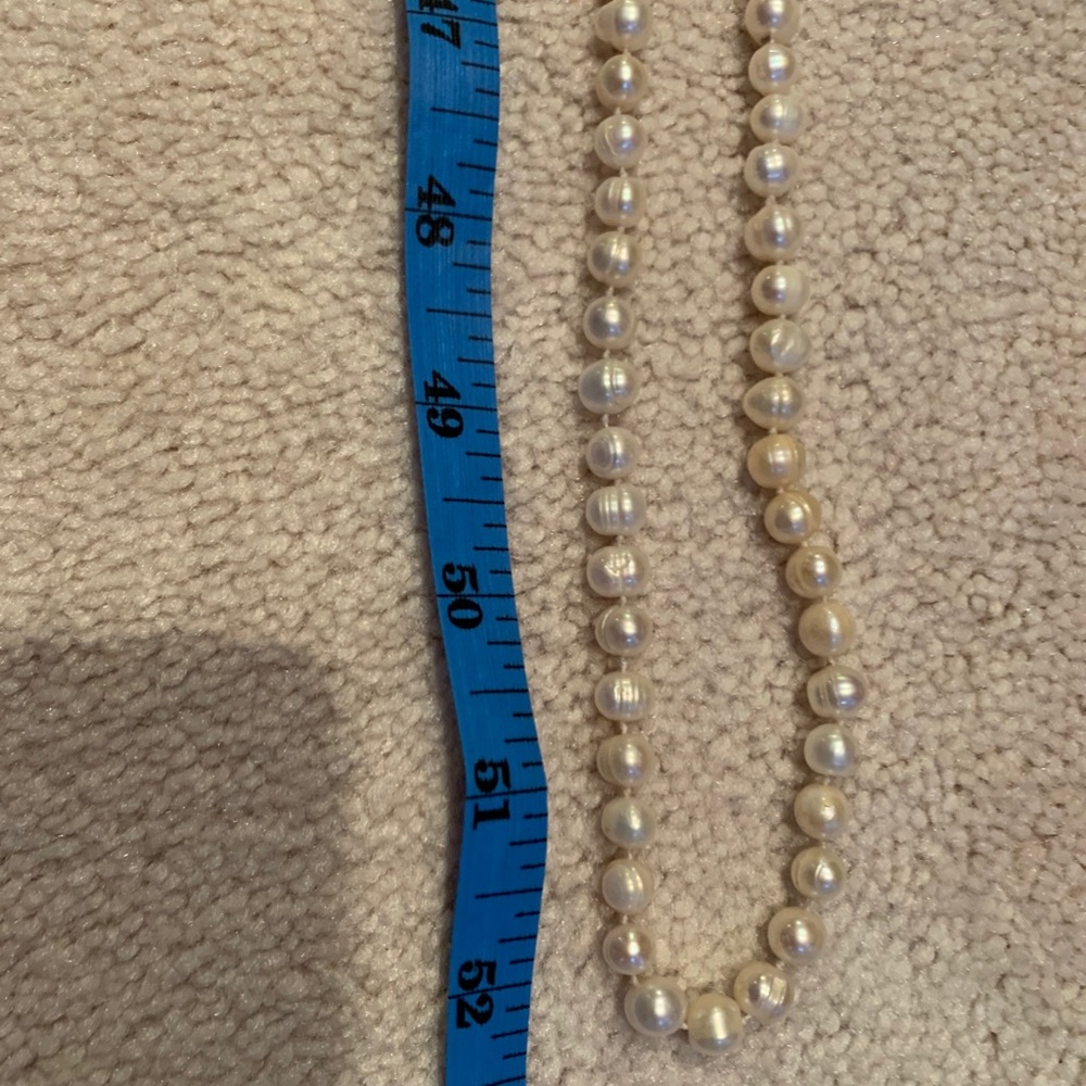 Strand of pearls 52” long!